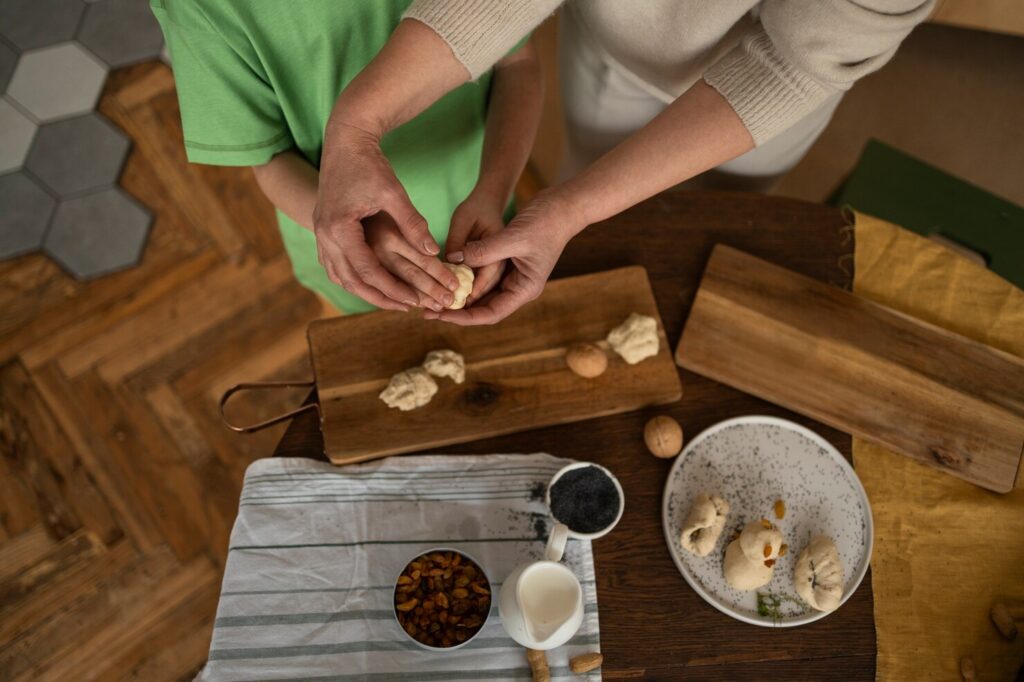 top-view-woman-kid-preparing-food