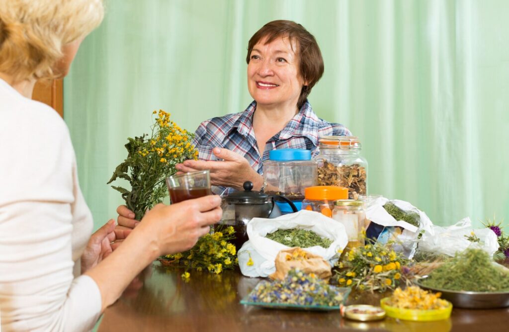 woman-drinking-herbal-tea-with-her-friend